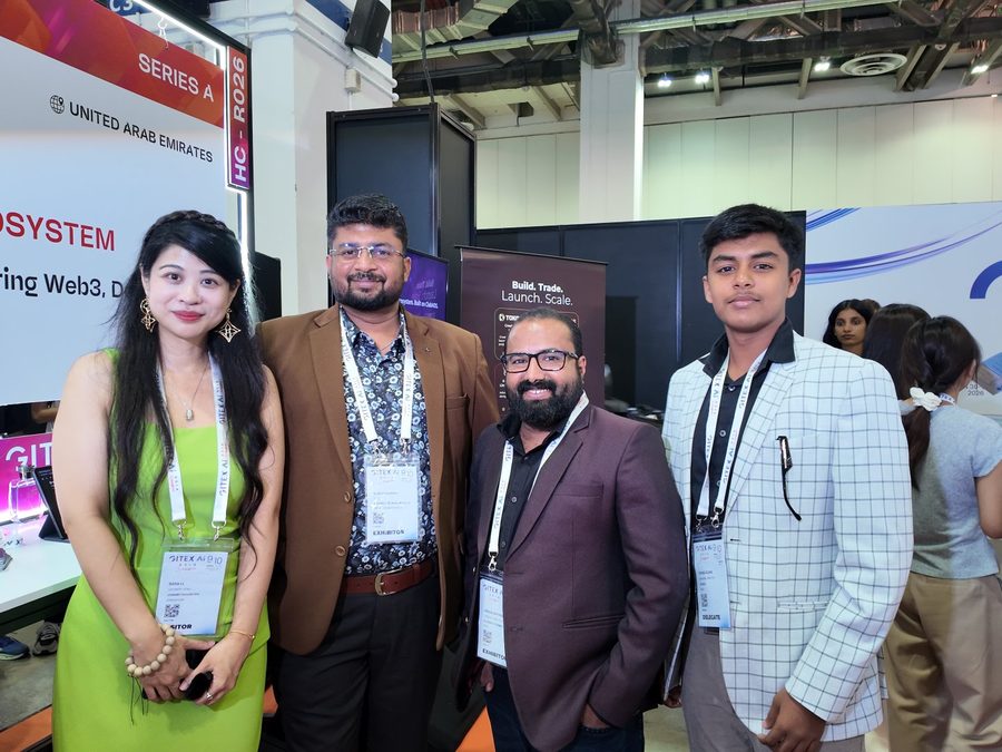 Web3Plus co-founder with exhibitors at the GITEX Asia blockchain ecosystem showcase